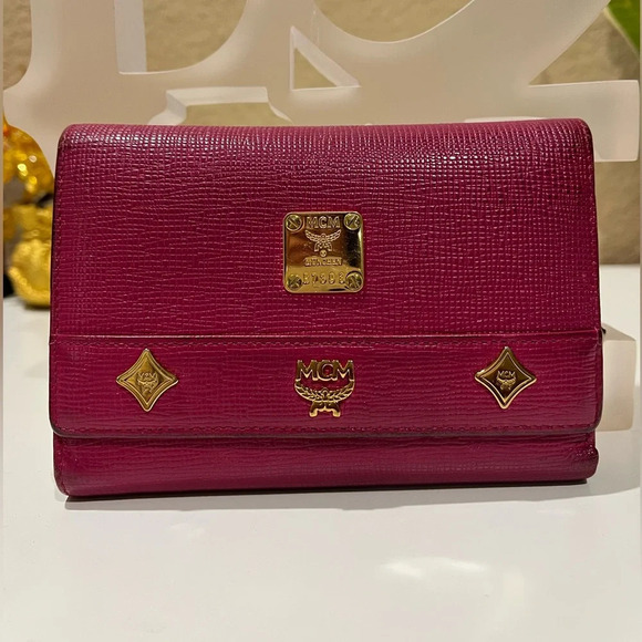 MCM Handbags - MCM DARK PINK TRIFOLD WALLET WITH MCM CHARM